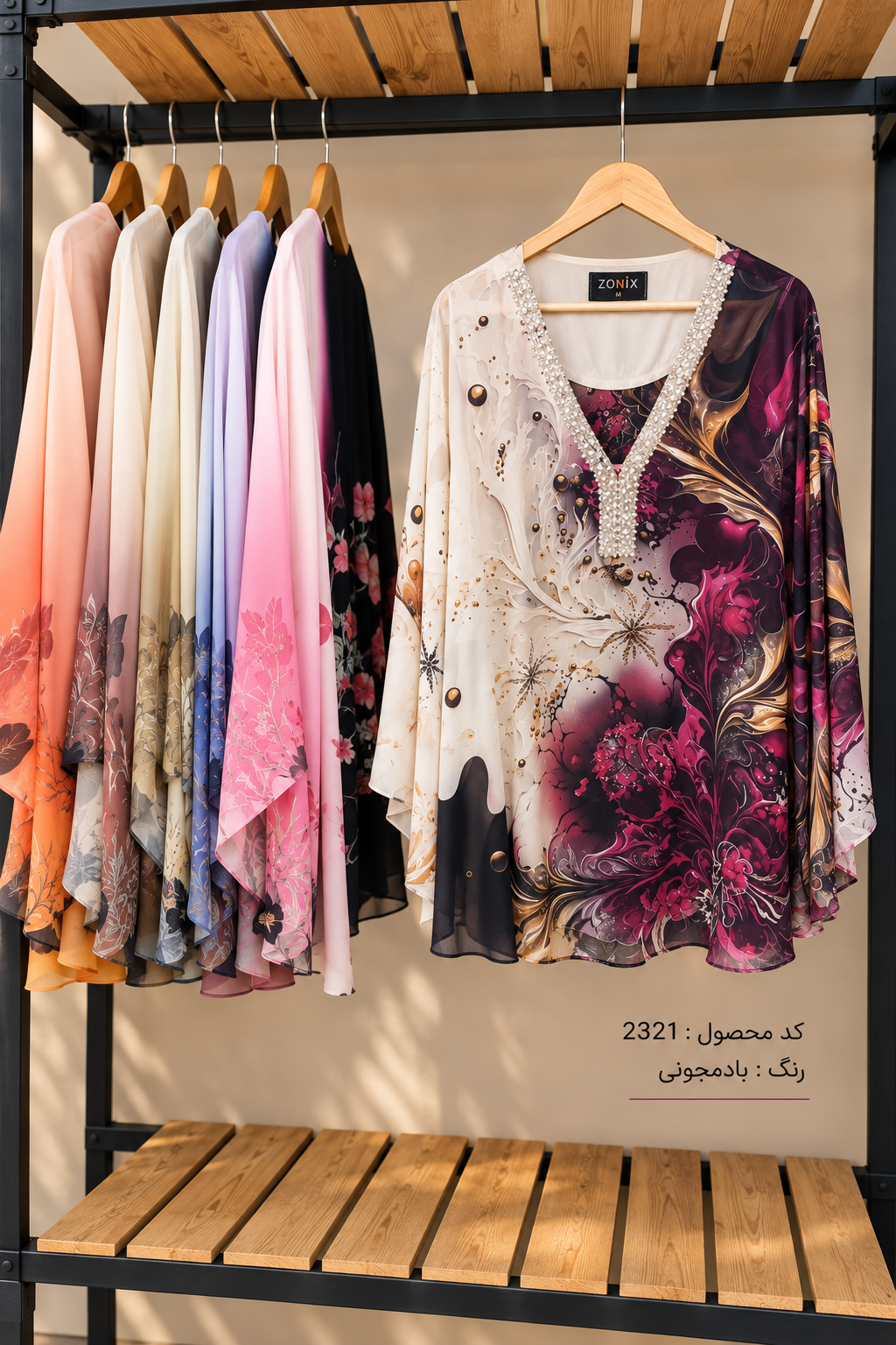 splus-2321-plum-printed-blouse-hanger.webp شومیز زنانه طرحدار بادمجونی اسپلاس کد ۲۳۲۱ روی رگال با یقه مهرهکاریشده