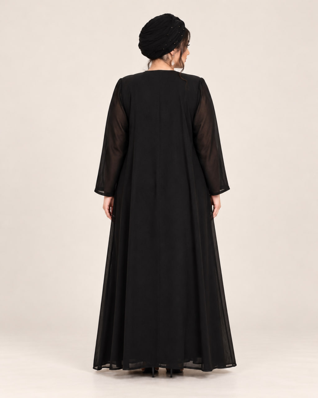 black-chiffon-maxi-dress-back.webp نمای پشت پیراهن بلند مجلسی مشکی
