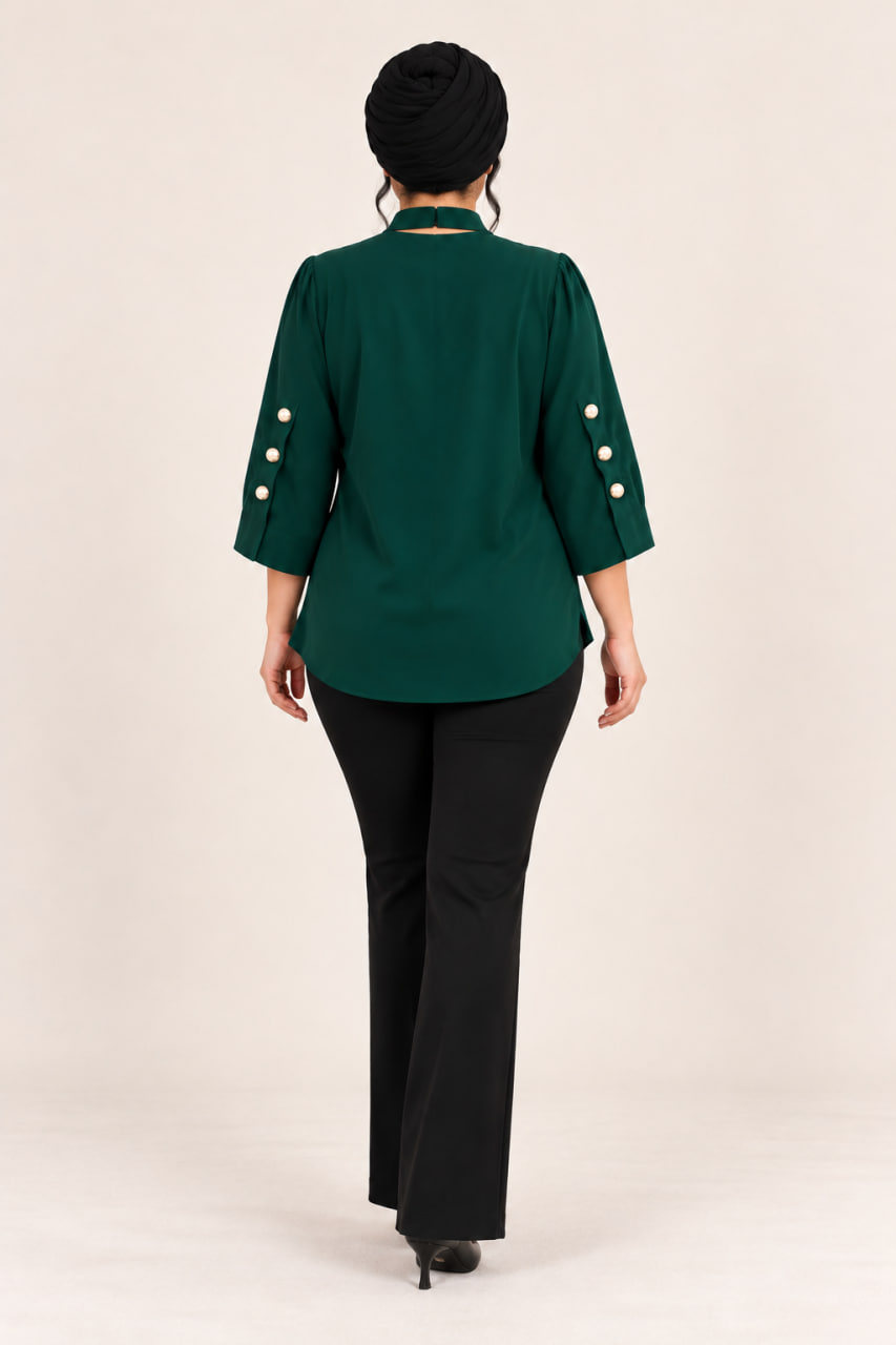 splus-4405-jade-green-back.webp نمای پشت شومیز زنانه دو یقه کد ۴۴۰۵ رنگ سبز یشمی با آستین سهربع دکمهدار و لبه پایین منحنی